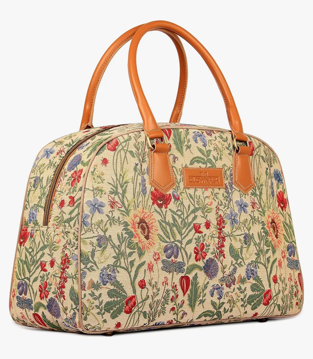 Floral fabric duffle bag with tan leather handles